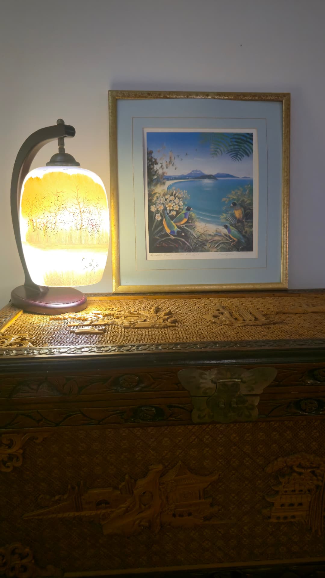 Hand-carved cabinet art inside the home