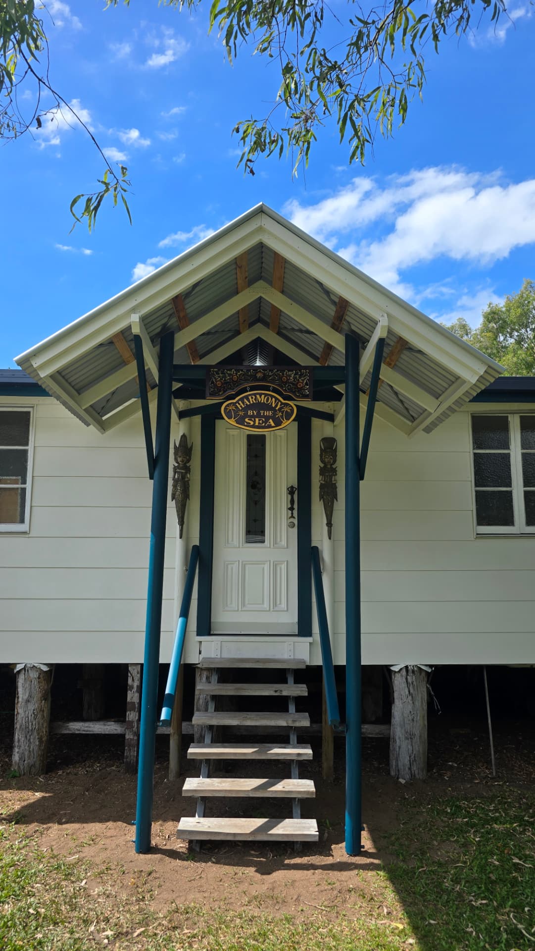 Front entrance and sign of Harmony by the Sea